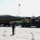 Chinese military DF-5B missiles are presented during a military parade in Tiananmen Square in Beijing on September 3, 2015, to mark the 70th anniversary of victory over Japan and the end of World War II. AFP PHOTO / POOL / ROLEX DELA PENA (Photo credit should read ROLEX DELA PENA/AFP/Getty Images)